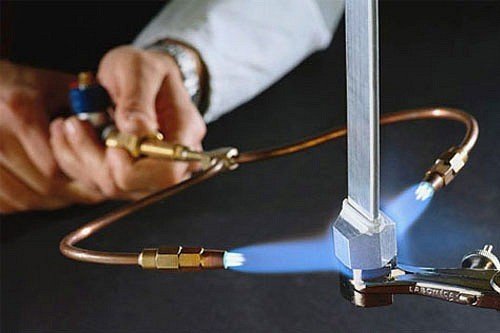 Nhận biết vàng giả bằng lửa khò